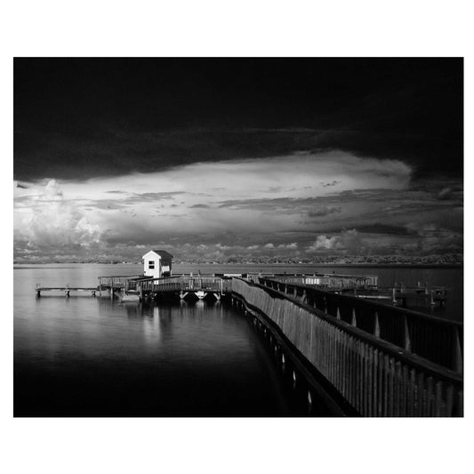 Charles Dean Carpino, Lake Dora Dock, Lakeside Inn,  Mount Dora, FL. infrared photograph, black and white, enhanced contrast, 8x10,  matted to 11x14,  framed.