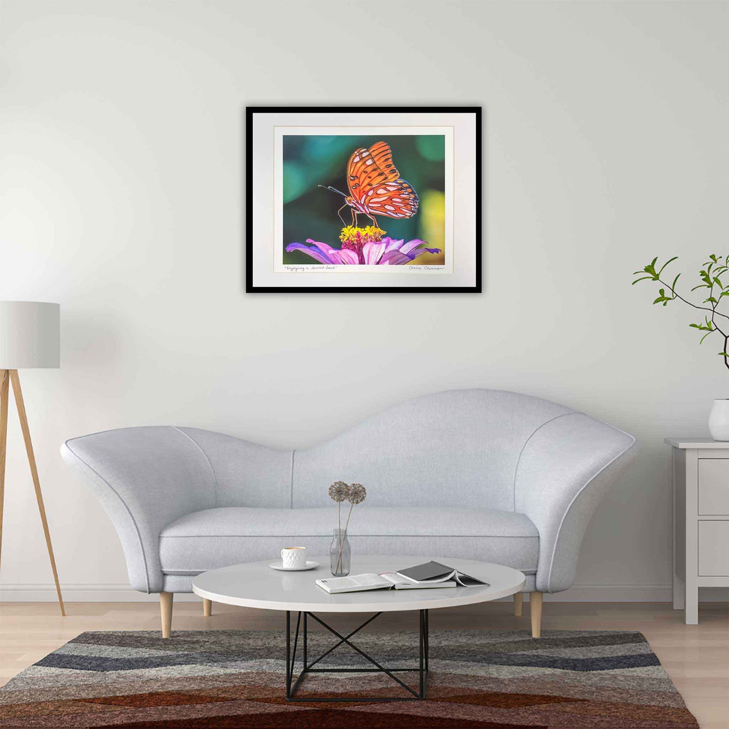 ECC “Enjoying a Sweet Treat” Matted Photographic Print by Photographer Claire Closson. Shows a beautiful Gulf Fritillary Butterfly. Photographed in Leu Gardens. Orange, white and black butterfly on a purple and yellow cosmos. Subtle green background. Ready to be framed. Wildlife phtography. 11X14