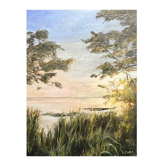 JRO God’s Glory - Sunrise over Wetlands. Serene view of soft sunlight as it filters through the leaves of the trees. This original painting by artist Becky Owen, features soft blue sky, and warm yellow tones of the sunrise. Luxurious grasses in the foreground and calm water that reflects the sunrise. Framed in a pale wooden frame to 12" x 17"