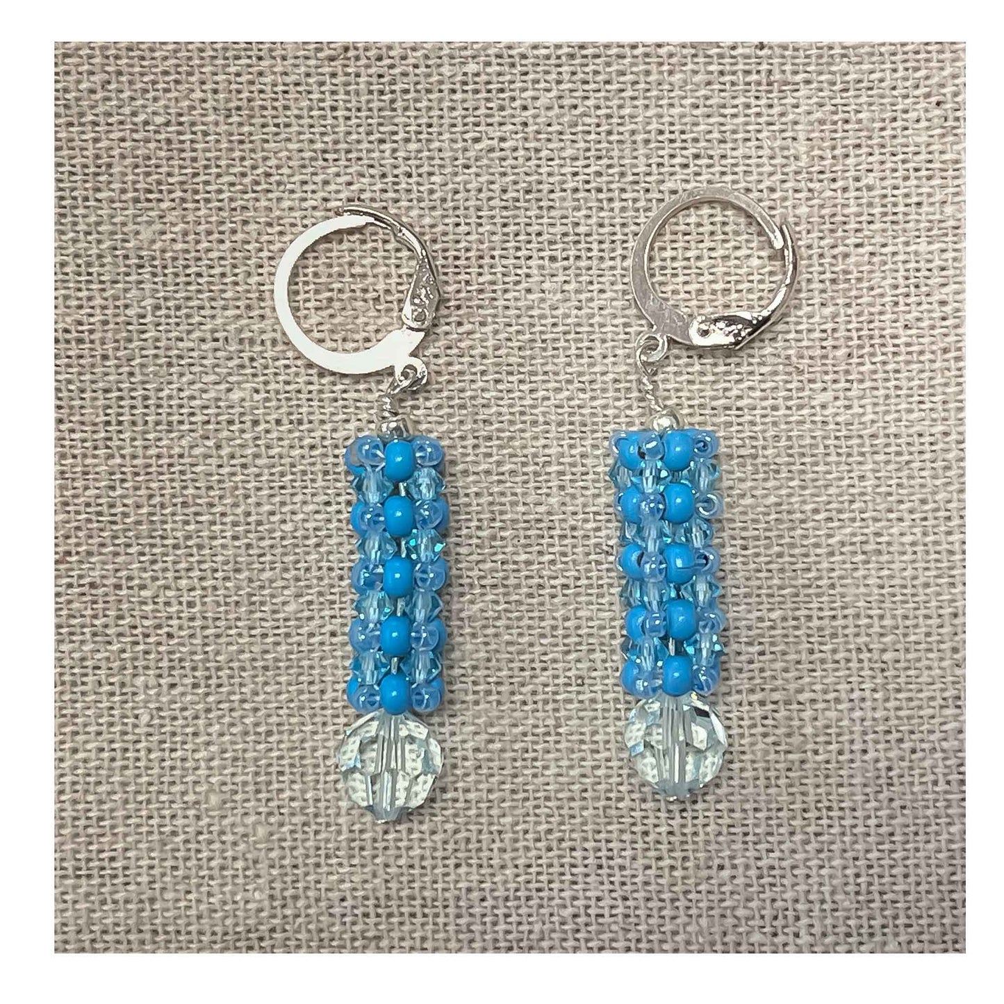 Light blue,  2mm metal beads, Beaded earrings, cubic right angle weave stitch,  Swarovski crystals, sterling silver, lever backs.