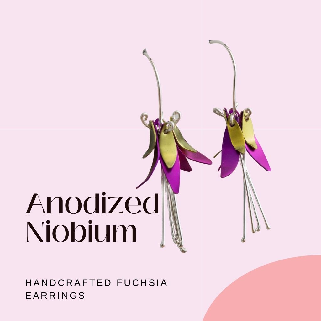 pink and yellow fuchsia earrings on pink background