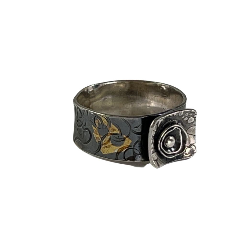 size view of ring showing metalsmithing on band
