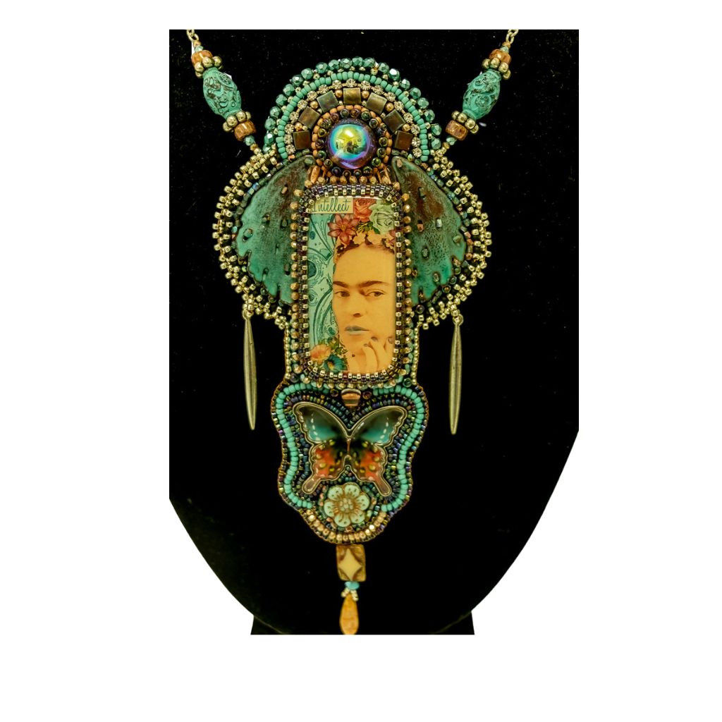 close up of main elements of pendant with Frida Kahlo