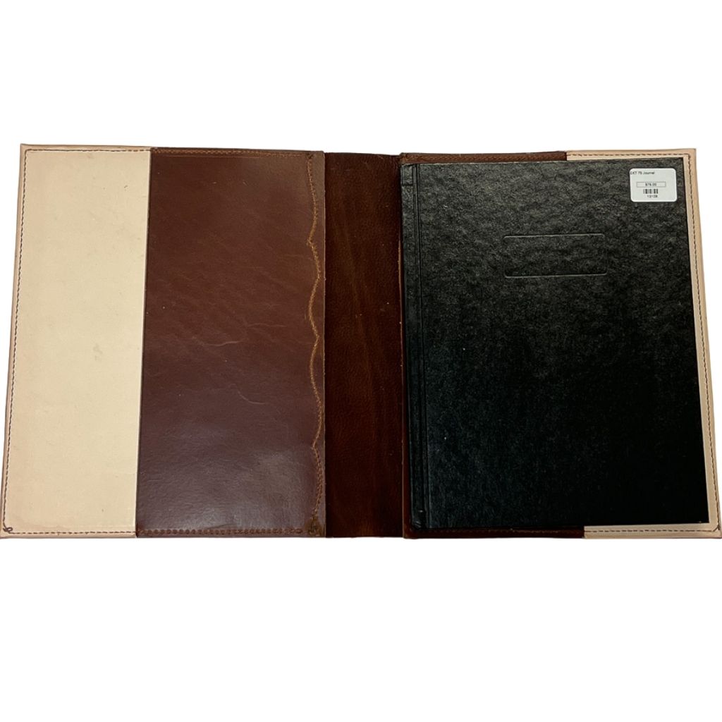 inside of leather journal featuring dark brown and tan leather