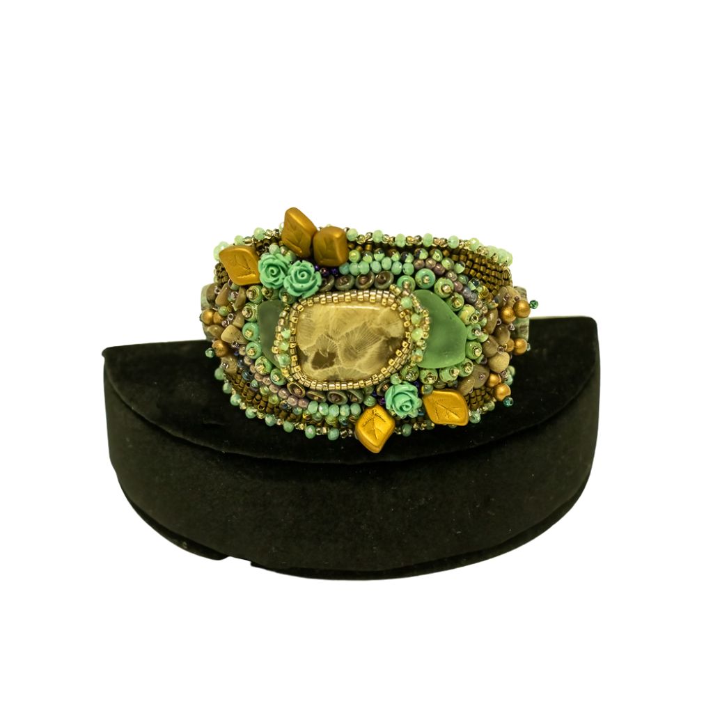 frontal view of petoskey rose cuff with beads 