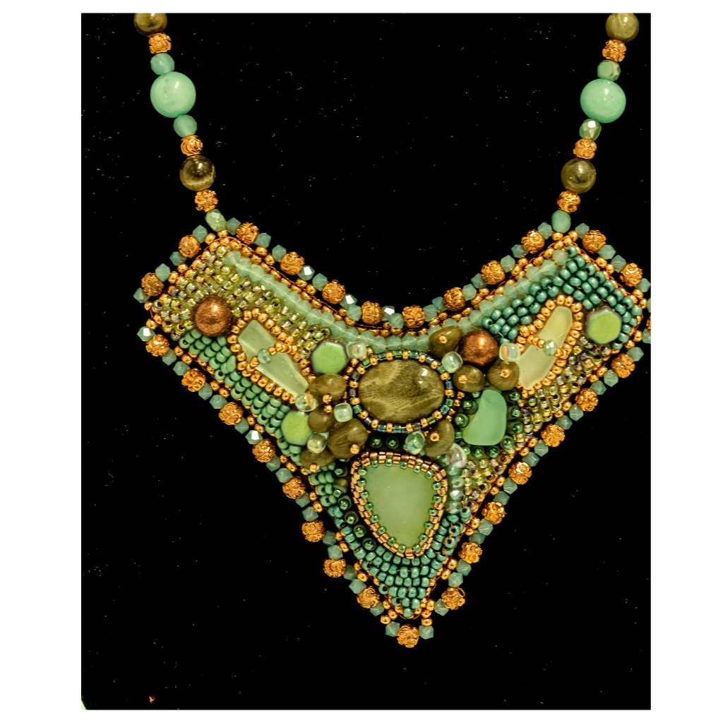 Neckpiece embellished with stones and beads in turquoise and gold