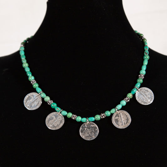 Turquoise and mercury dime necklace on black