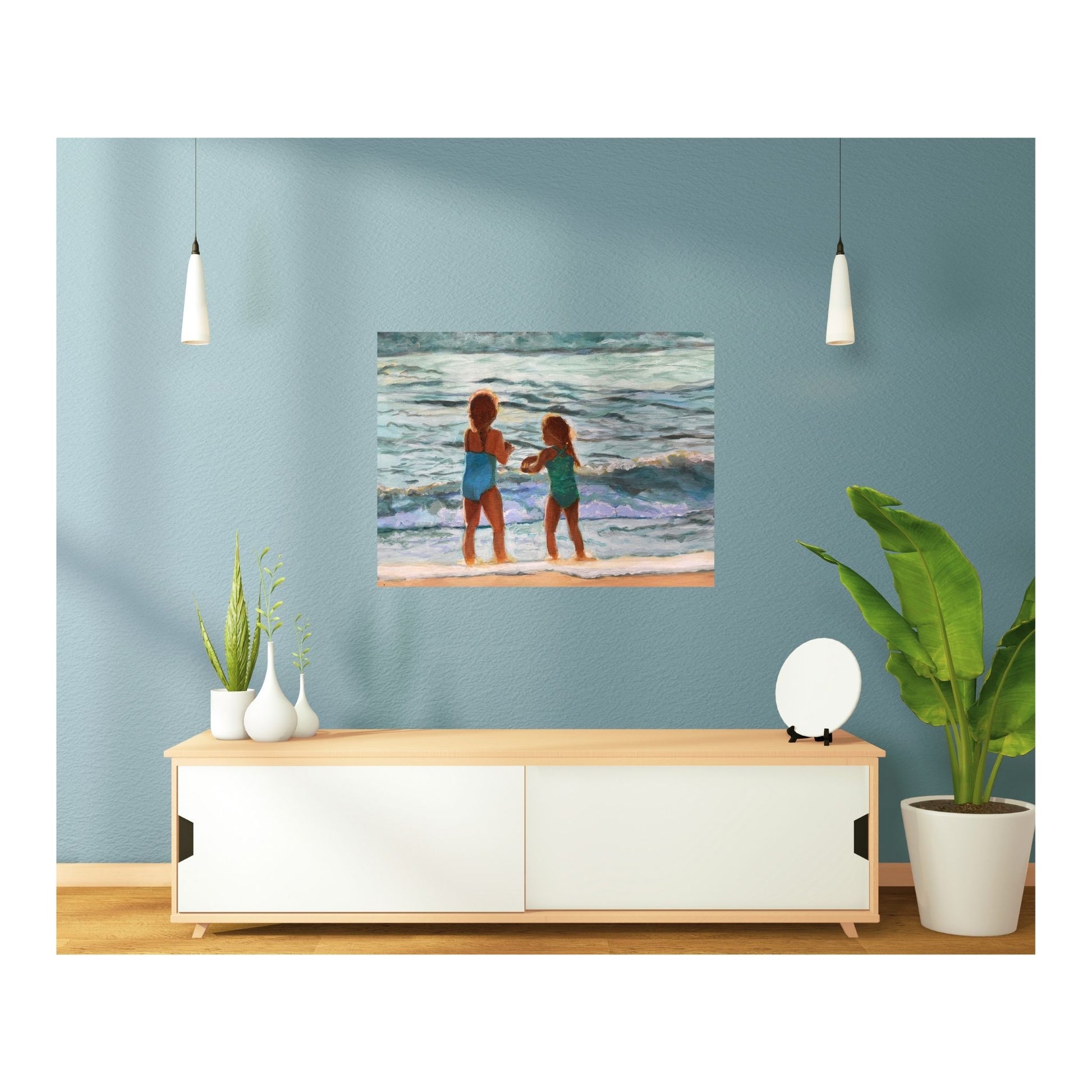 print above a white credenza on a blue wall
